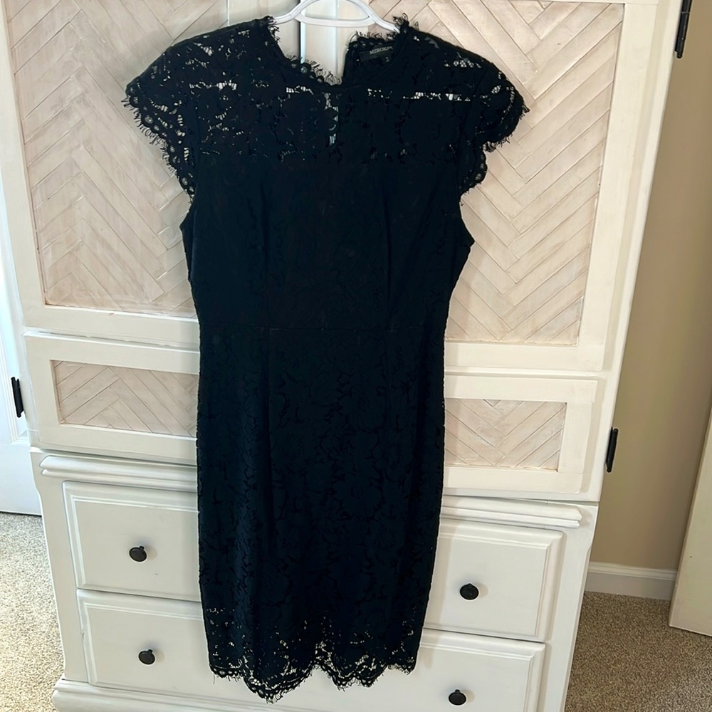 Size small, black all over lace dress. Below knee length. Worn 1 time